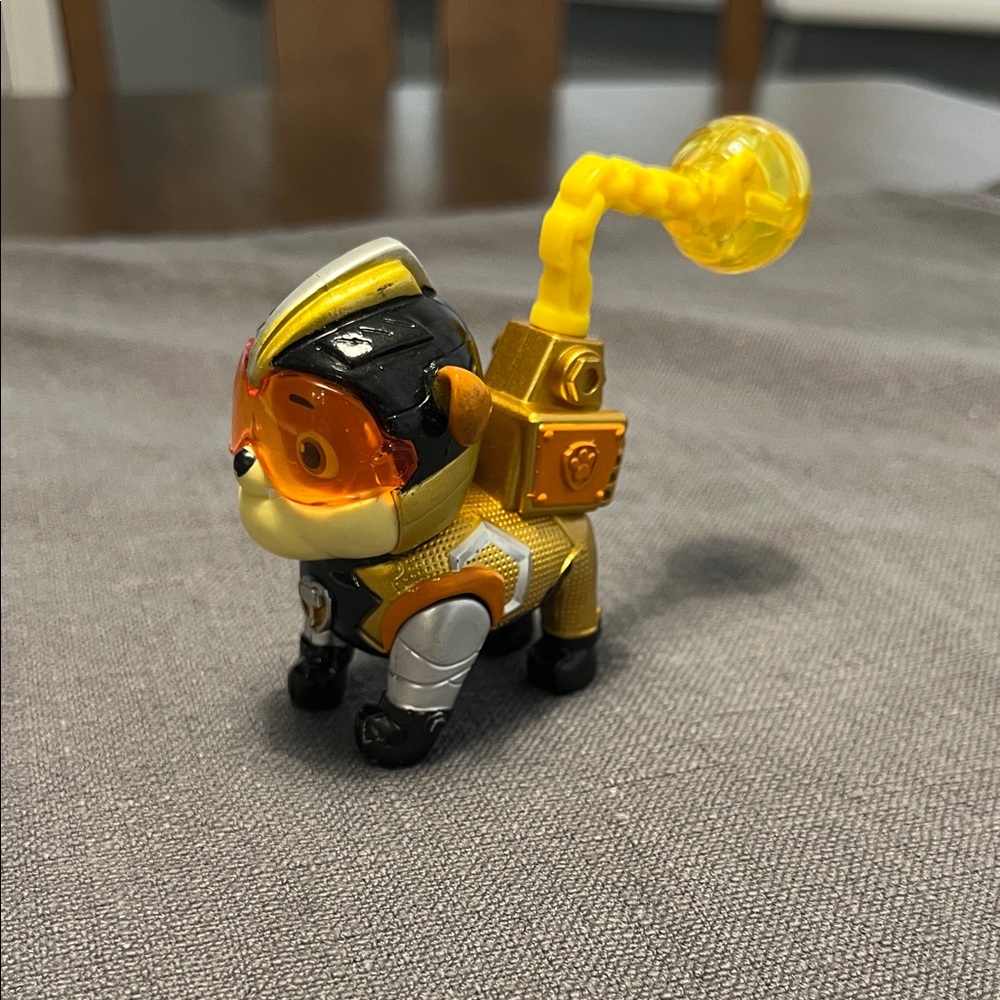 Paw Patrol Mighty Pups Rubble Action Figure - Yellow, Black, and Orange